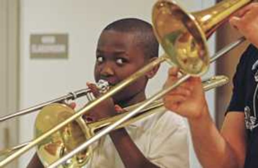 trombone 311 (photo credit: Carl Juste/Miami Herald/MCT)