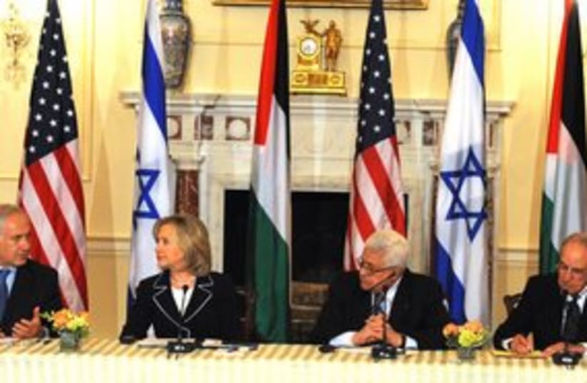 311_Netanyahu, Clinton, Abbas and Mitchell at table (photo credit: Moshe Milner / GPO)