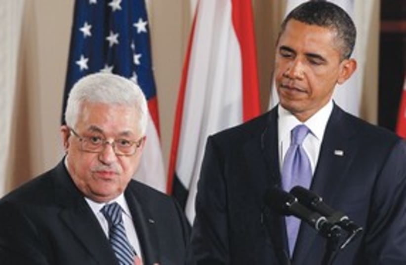 Abbas speaks Obama looks on (photo credit: Associated Press)