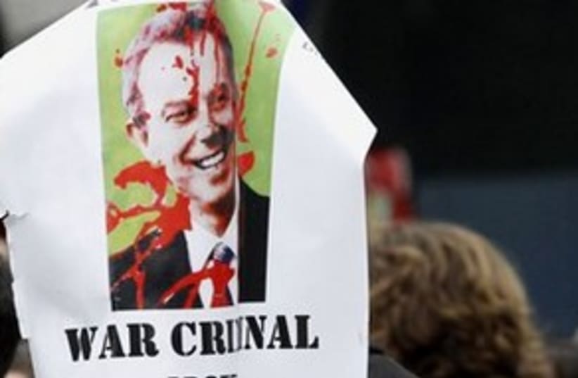 Tony Blair war criminal poster 311 (photo credit: AP Photo/Peter Morrison)