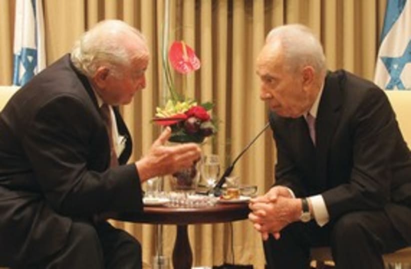 Peres with Aushwitz survivor 311 (photo credit: Yosef Avi Yair Engel)