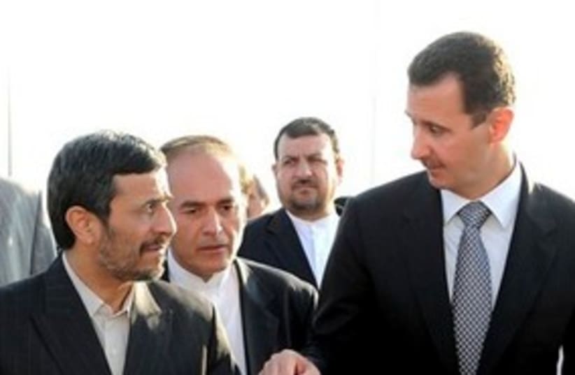 Assad and Ahmadinejad meeting 311 (photo credit: AP Photo/ Sana-HO)