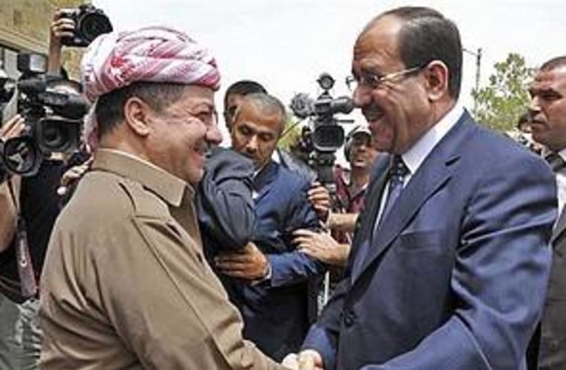 Maliki and Kurdish leader 311 (photo credit: AP)