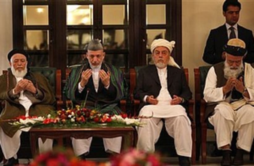 Karzai_peace_311 (photo credit: ASSOCIATED PRESS)