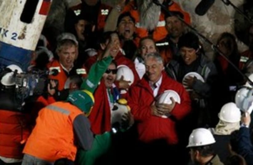 311_Chile miners celebration (photo credit: Associated Press)