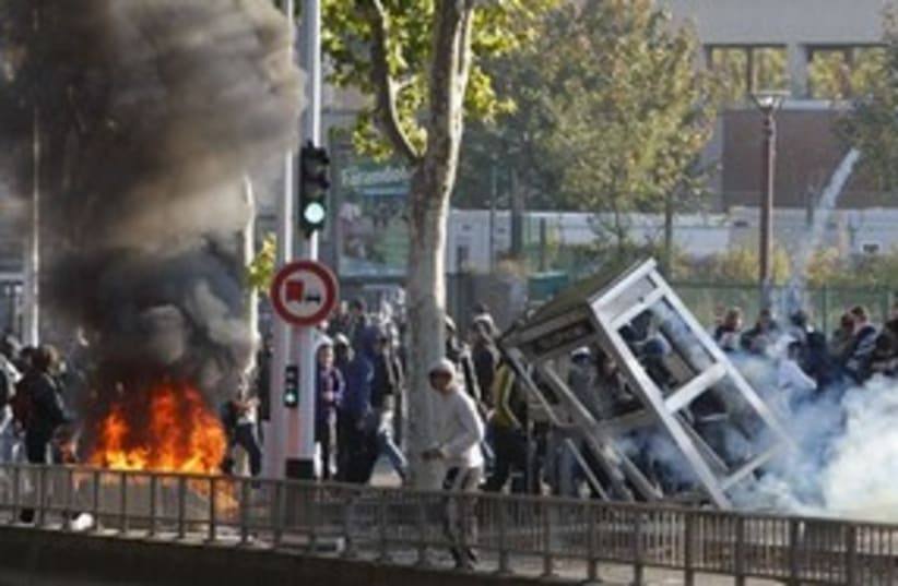 France strikes burning 311 AP (photo credit: AP)