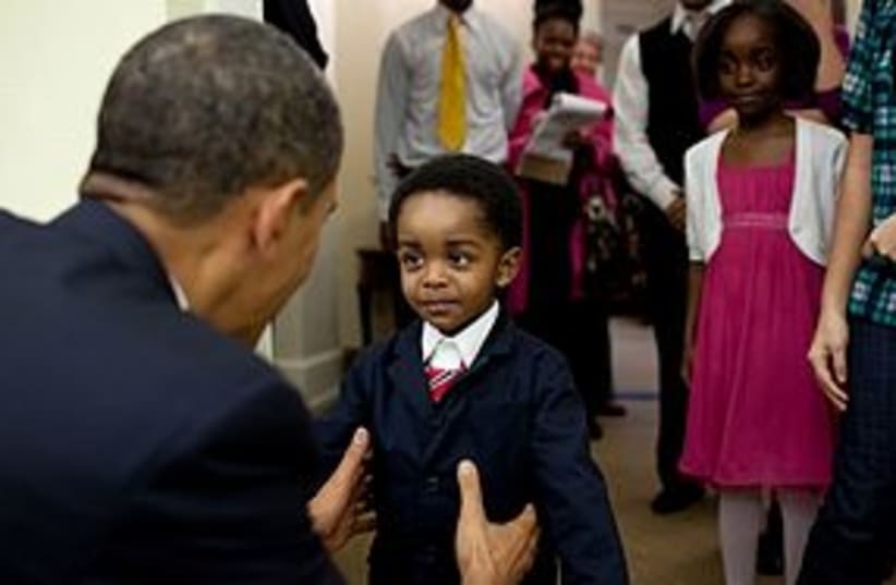 obama and cute kid 311 (photo credit: Official White House Photo by Pete Souza)