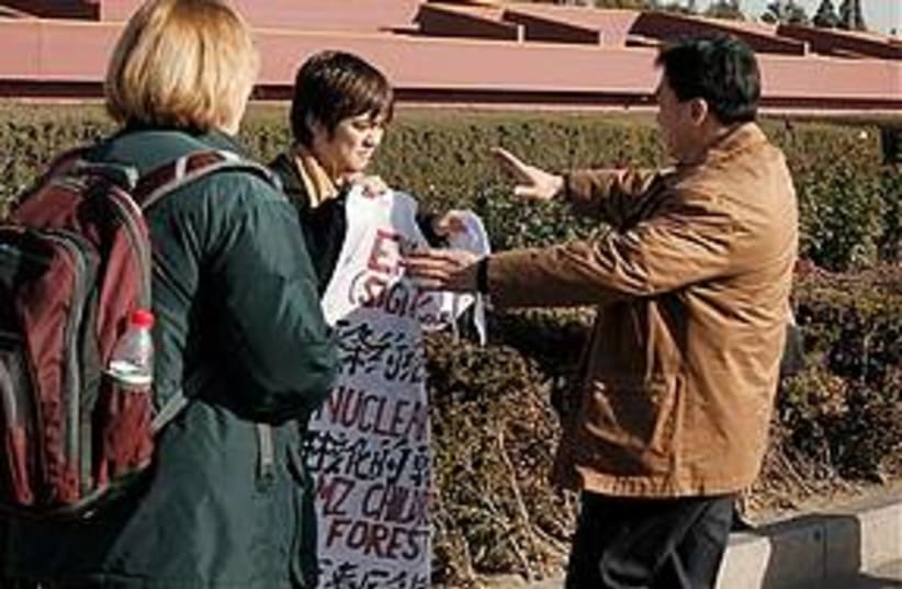 Jonathan Lee protest China (photo credit: ASSOCIATED PRESS)