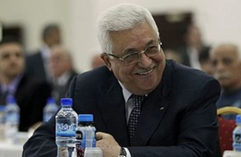 Abbas smiling (photo credit: ASSOCIATED PRESS)