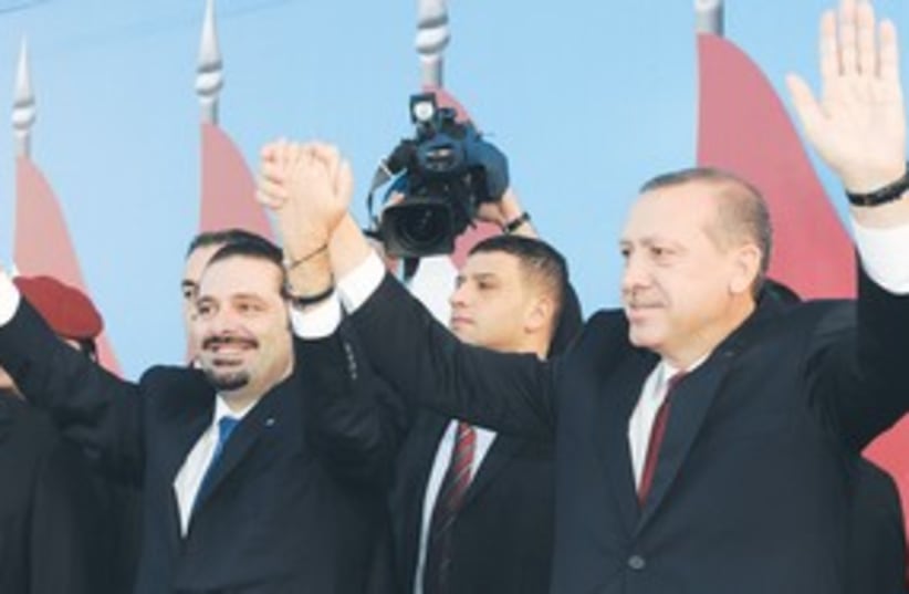 Saad Hariri,  Erdogan waving 311 (photo credit: Ahmad Omar/AP)