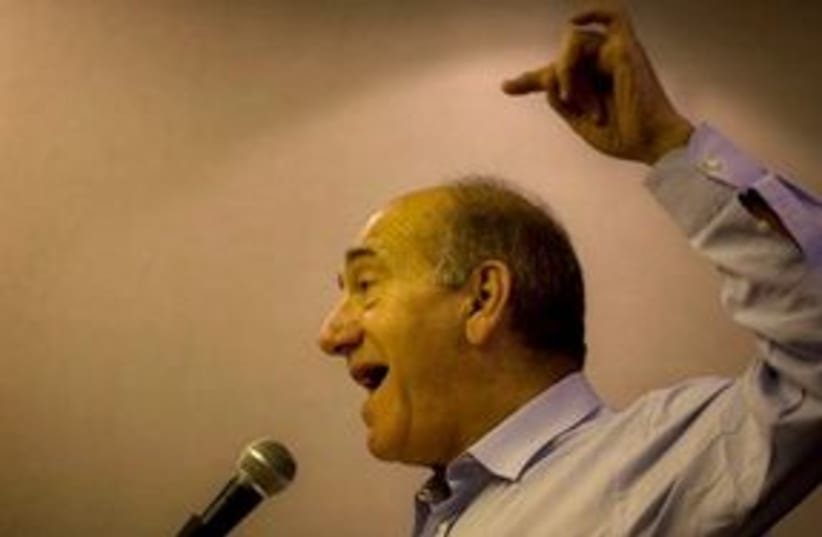 Olmert speaks 311 (photo credit: Associated Press)