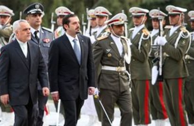 Lebanese PM Hariri and Iranian VP Rahim 311 AP (photo credit: AP)