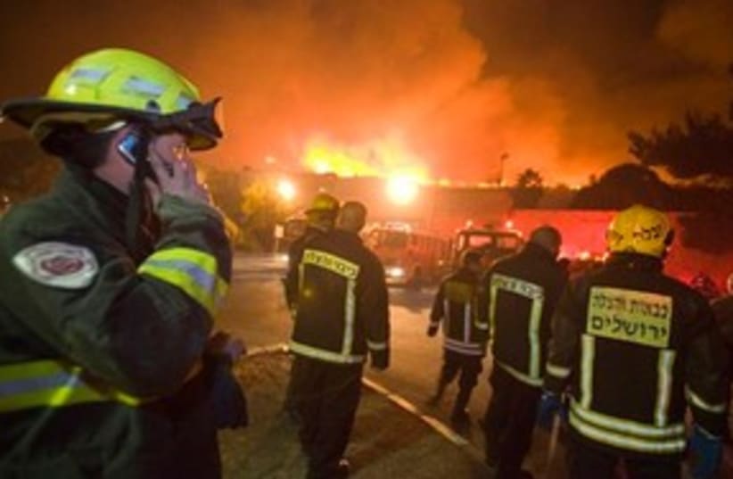 Carmel Firefighters 311 (photo credit: Associated Press)