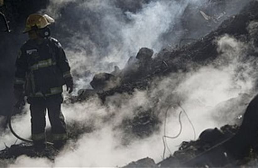 Firefighter carmel 311 ap (photo credit: Associated Press)