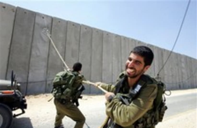 gaza fence troops 224.88 (photo credit: AP)