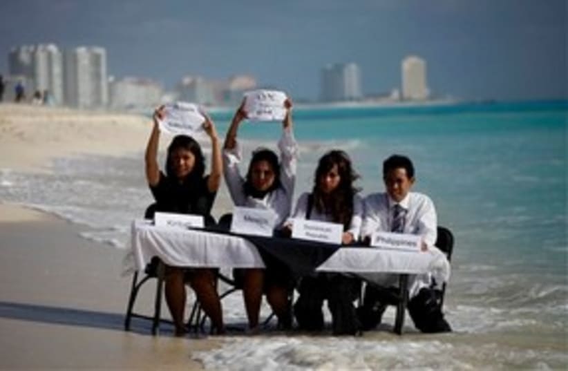 UN Cancun Climate Summit protesters 311 AP (photo credit: AP)