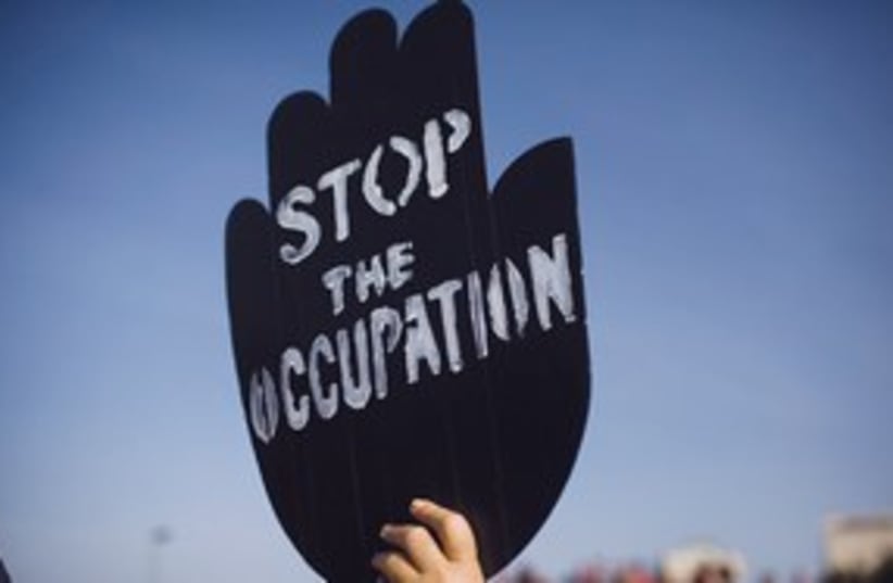 Stop the occupation sign 311 (photo credit: AP)