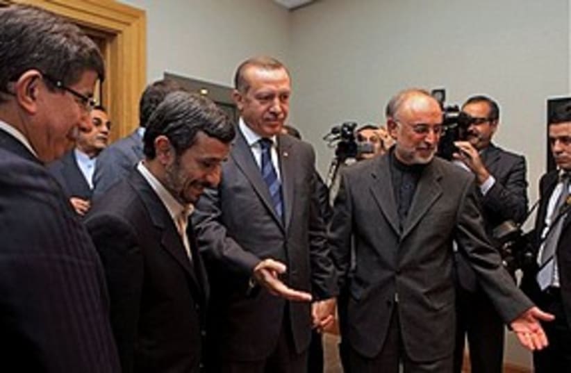 Erdogan Ahmadinejad Salehi in Istanbul 311 (photo credit: Associated Press)