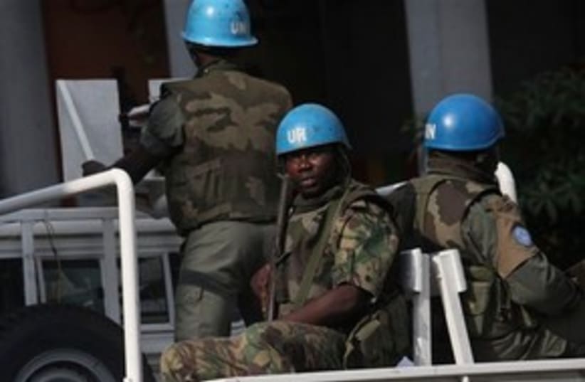 UN forces patrol in Ivory Coast (photo credit: AP Photo/Sunday Alamba)