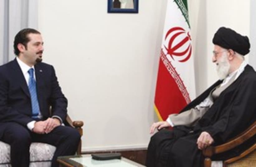 Hariri, Khamenei meeting 311 (photo credit: AP)