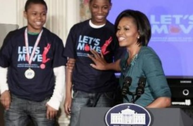 Michelle Obama Move it (photo credit: Associated Press)
