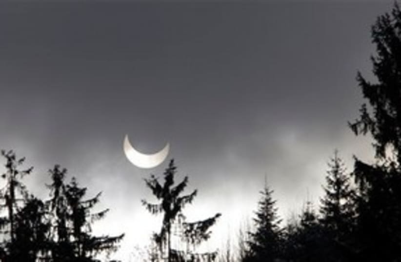 Solar Eclipse 311 (photo credit: Associated Press)
