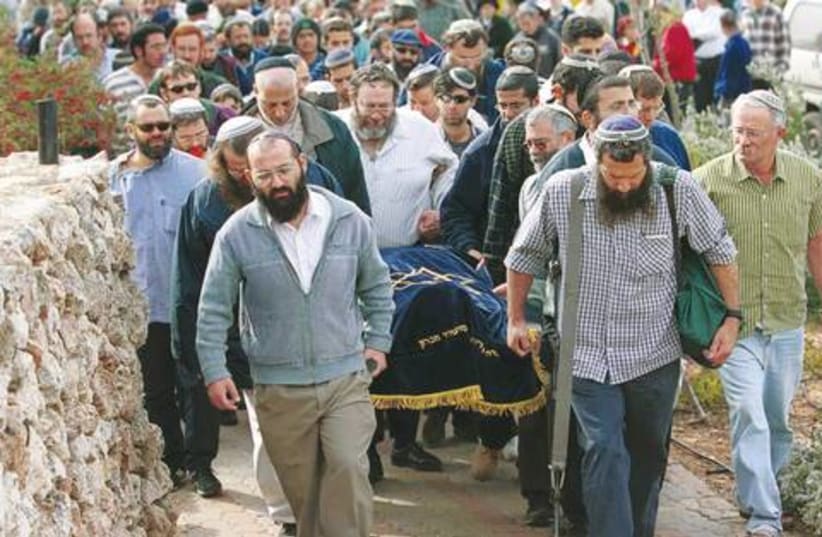 Funeral settlers Kiryat Arba terror victims 521 (do not publish again) (photo credit: Flash 90)