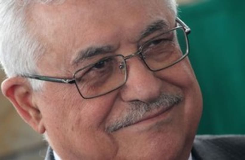 Abbas smiling 311 AP (photo credit: AP)