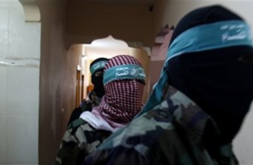 Masked Hamas officials press conference Gaza 311 AP (photo credit: AP)