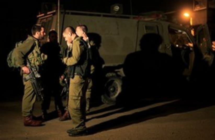 IDF soldiers on Gaza border 311 (photo credit: AP)