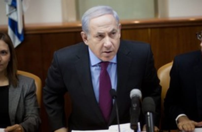 Netanyahu leaning 311 (photo credit: Emile Salman)