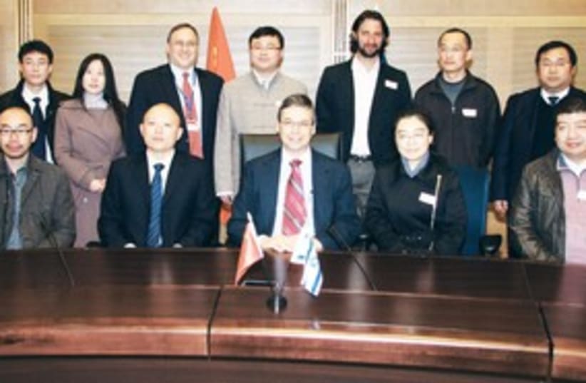 Ayalon hosts Chinese Prof. Yiyi Chen 311 (photo credit: Isaac Harari/Israel Sun)