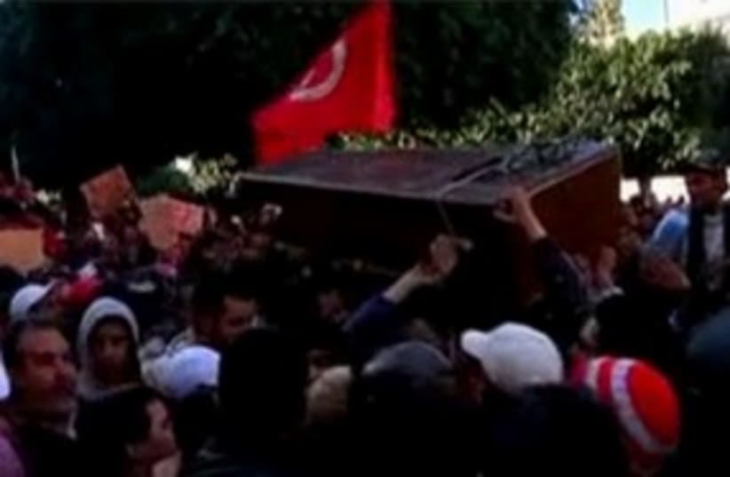 Tunisia protests coffin 311 (photo credit: Rueters Video)