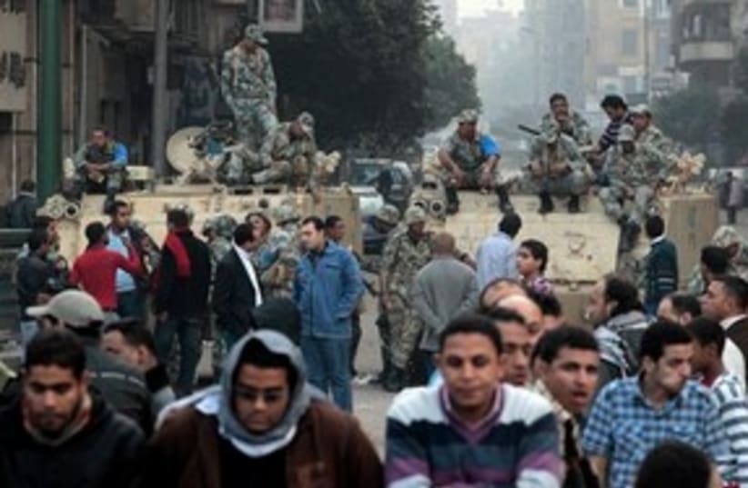 Cairo protesters soldiers 311 (photo credit: Associated Press)