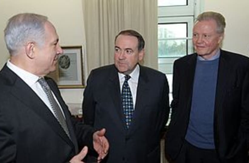 netanyahu huckabee voight 311 (photo credit: GPO / Amos Ben-Gershom)