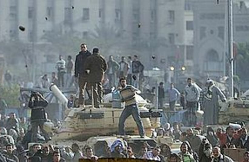 egypt protest rock throwing 311 (photo credit: AP)