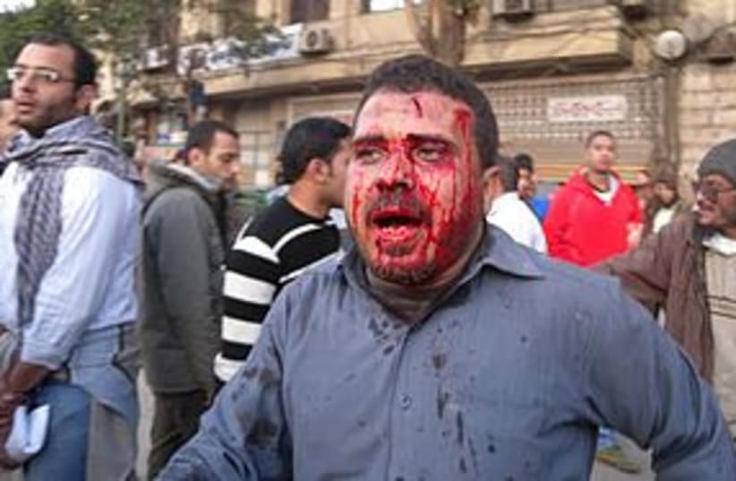 bloody egypt protester 311 (photo credit: MELANIE LIDMAN)