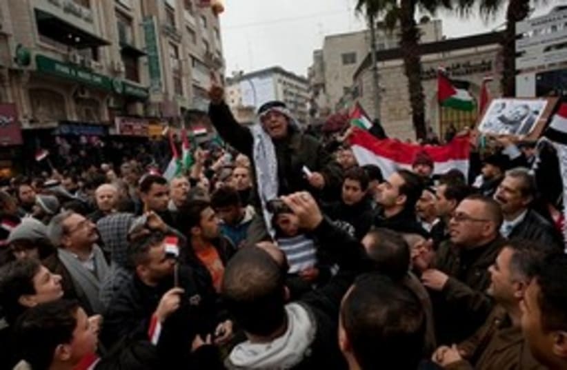 Anti-Mubarak protests in Ramallah (photo credit: AP)