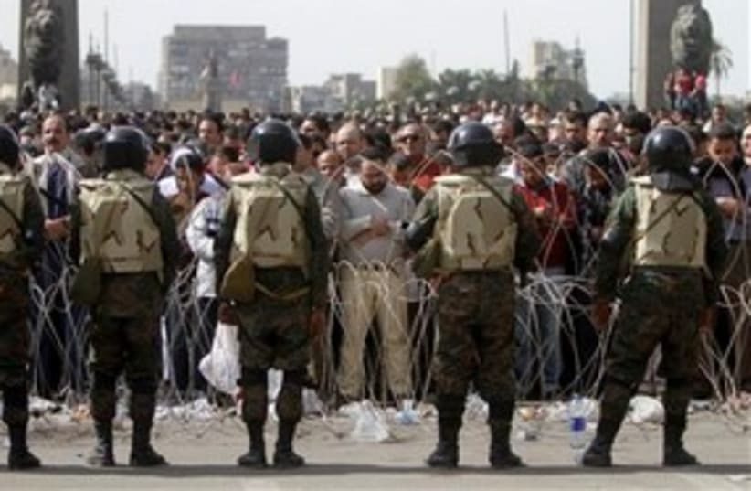 Egyptian troops and protesters in Tahrir Square 311 AP (photo credit: AP)