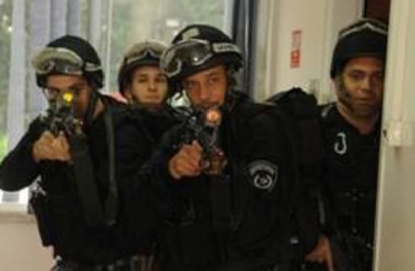 Police drill guns raid cops 311 (photo credit: Israel Police)