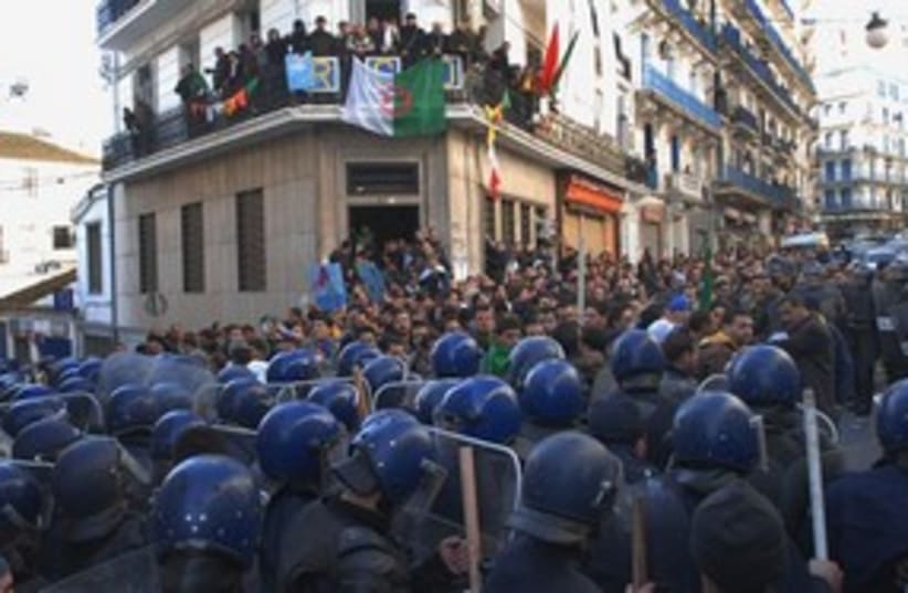 Algerian riot police banned rally 311 AP  (photo credit: AP)