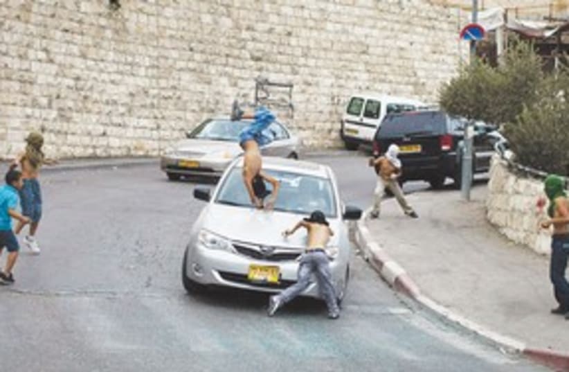 Silwan car crash 311 (photo credit: Ilia Yefimovich/AFP)
