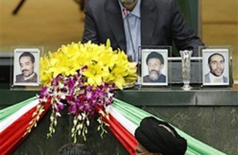 Iranian President Mahmoud Ahmadinejad, bottom left (photo credit: AP)