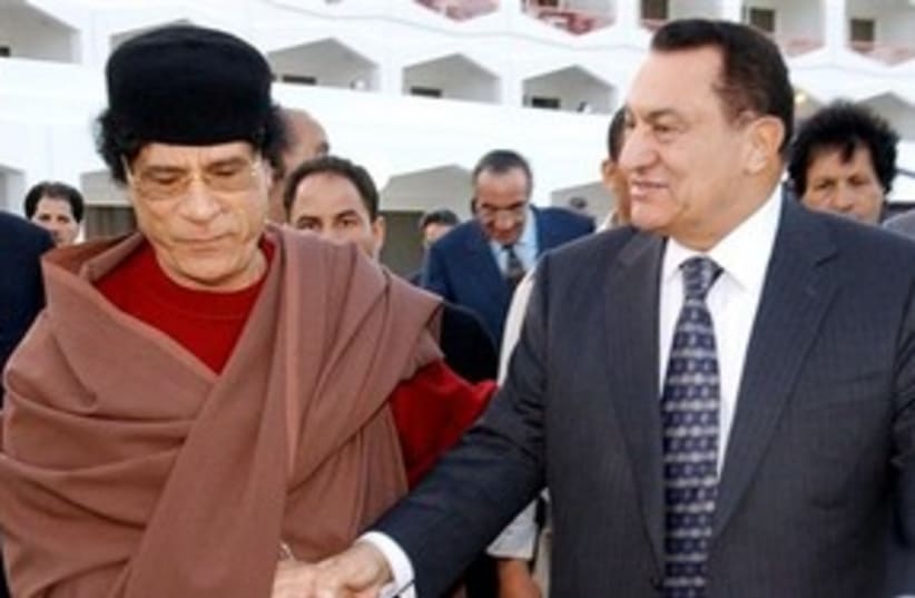 Libyan leader Muammar Gaddafi with Mubarak 311 AP (photo credit: AP)