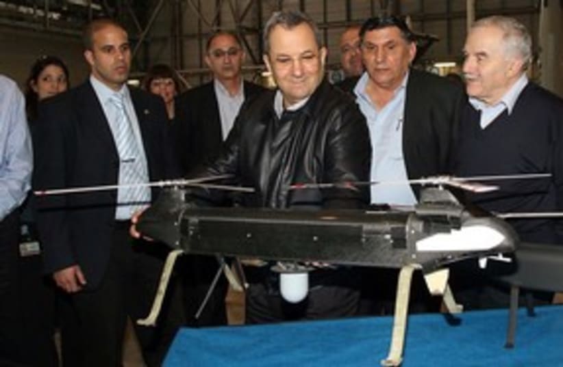 Barak at IAI with Ghost UAV drone 311 (photo credit: GIDEON MARKOWICZ)
