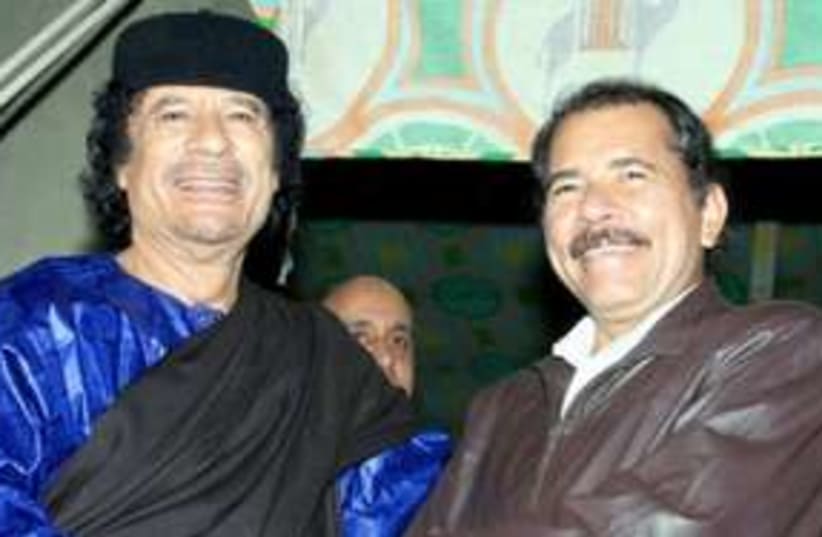 Nicaraguan President Daniel Ortega with Muammar Gaddafi 311  (photo credit: AP)