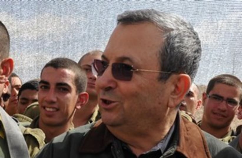 Barak with soldier in background 311 (photo credit: Linui Alihi, Defense Ministry)