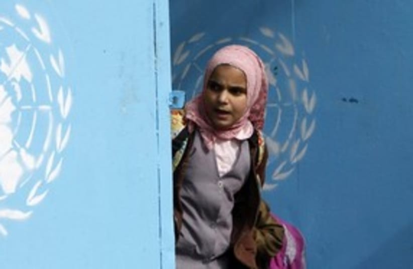 Palestinian girl at UNRWA school 311 Reu (photo credit: Ali Hashisho / Reuters)