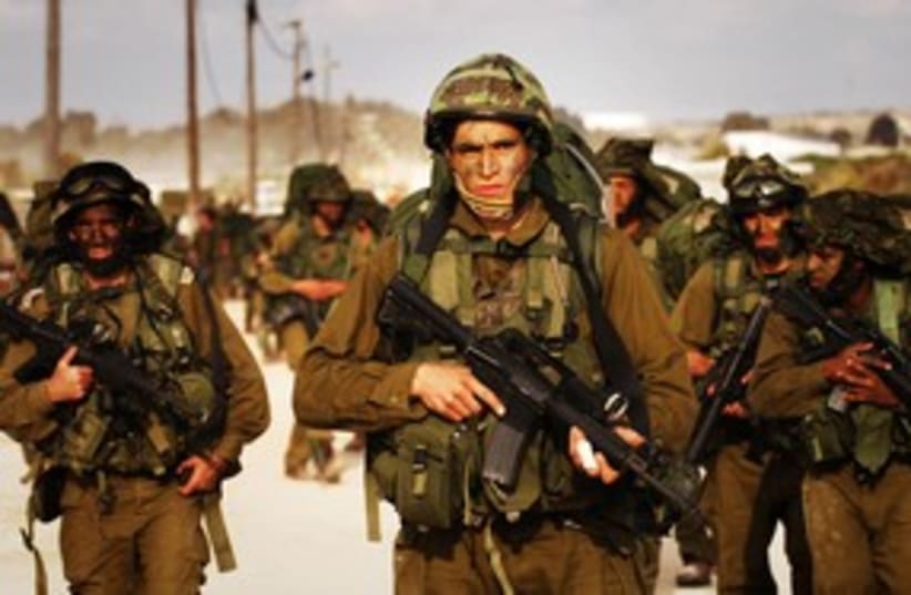 IDF soldiers marching  (R) 311 (photo credit: Reuters)