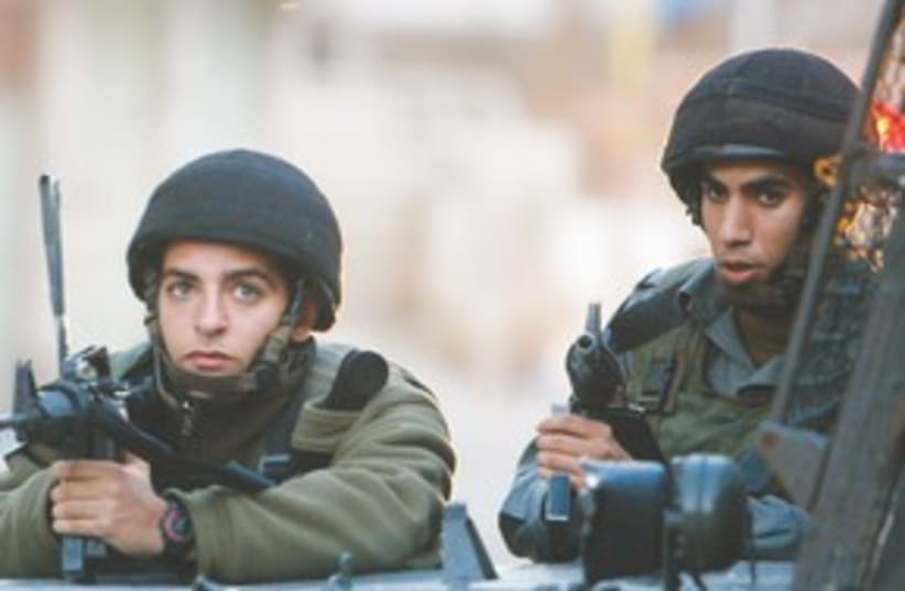 IDF soldiers  (R) 311 (photo credit: Reuters)